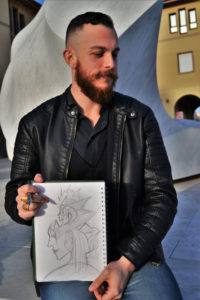 Giuseppe Tuveri con il disegno fatto durante l'intervista.